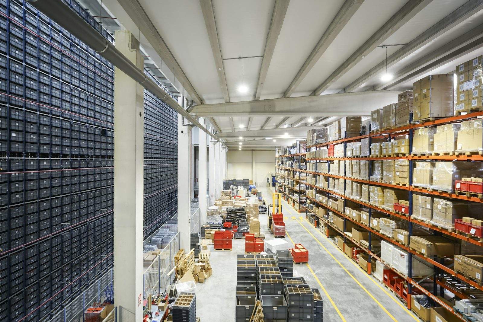 Warehouse aisle with racked packaging stock
